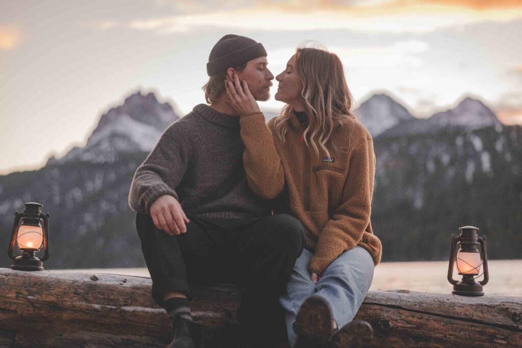 Couple gets engaged at the base of the Sawtooth Mountains for an Idaho wedding photographer.