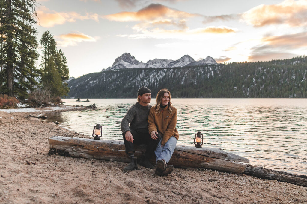 Couple gets engaged the base of the Sawtooth Mountains for an Idaho wedding photographer.